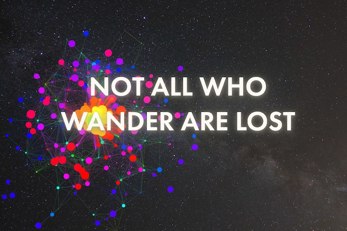 The quote 'Not All Who Wander Are Lost' floating against an outer space background, with the word 'wander' surrounded by the rainbow colors of the mouse cursor tail.